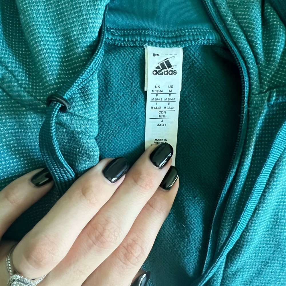 Teal colored Adidas sweater